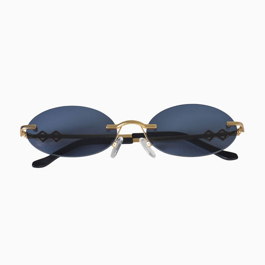 Front view | Oval sunglasses with navy blue lenses and gold frames | Metal | Vicky | Women's sunglasses | Karen Wazen Eyewear