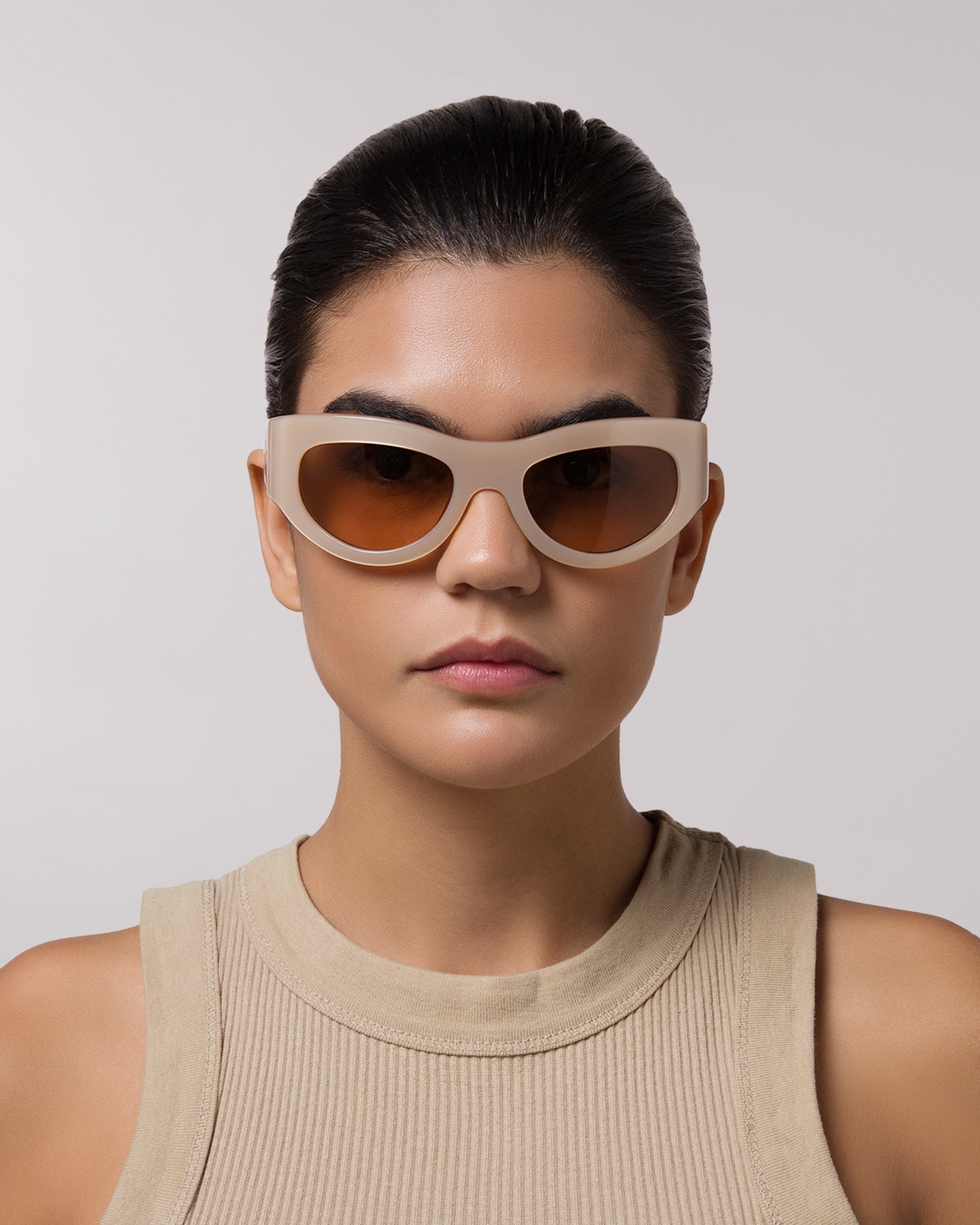 Front view of model wearing sunglasses  | Mask sunglasses with cream lenses and tortoise frames |  Acetate | Swim | Women's sunglasses | Karen Wazen Eyewear