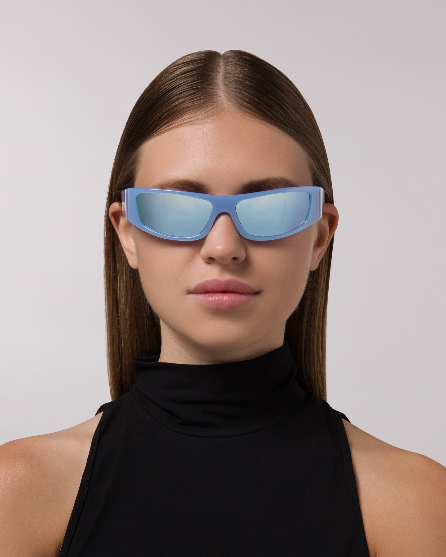 Front view of model wearing sunglasses | Rectangular sunglasses with mirror blue lenses and blue frames | Acetate | Sir | Women's sunglasses | Karen Wazen Eyewear