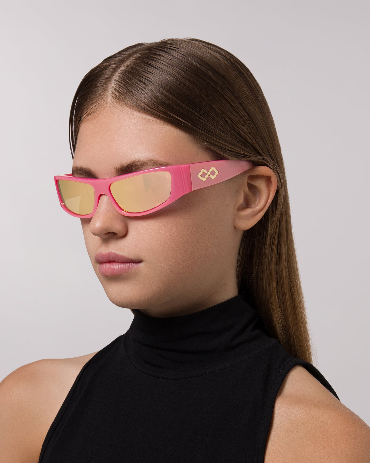 Side view of model wearing sunglasses  | Rectangular sunglasses with Mirror Pink lenses and Pink frames | Acetate | Sir | Wo