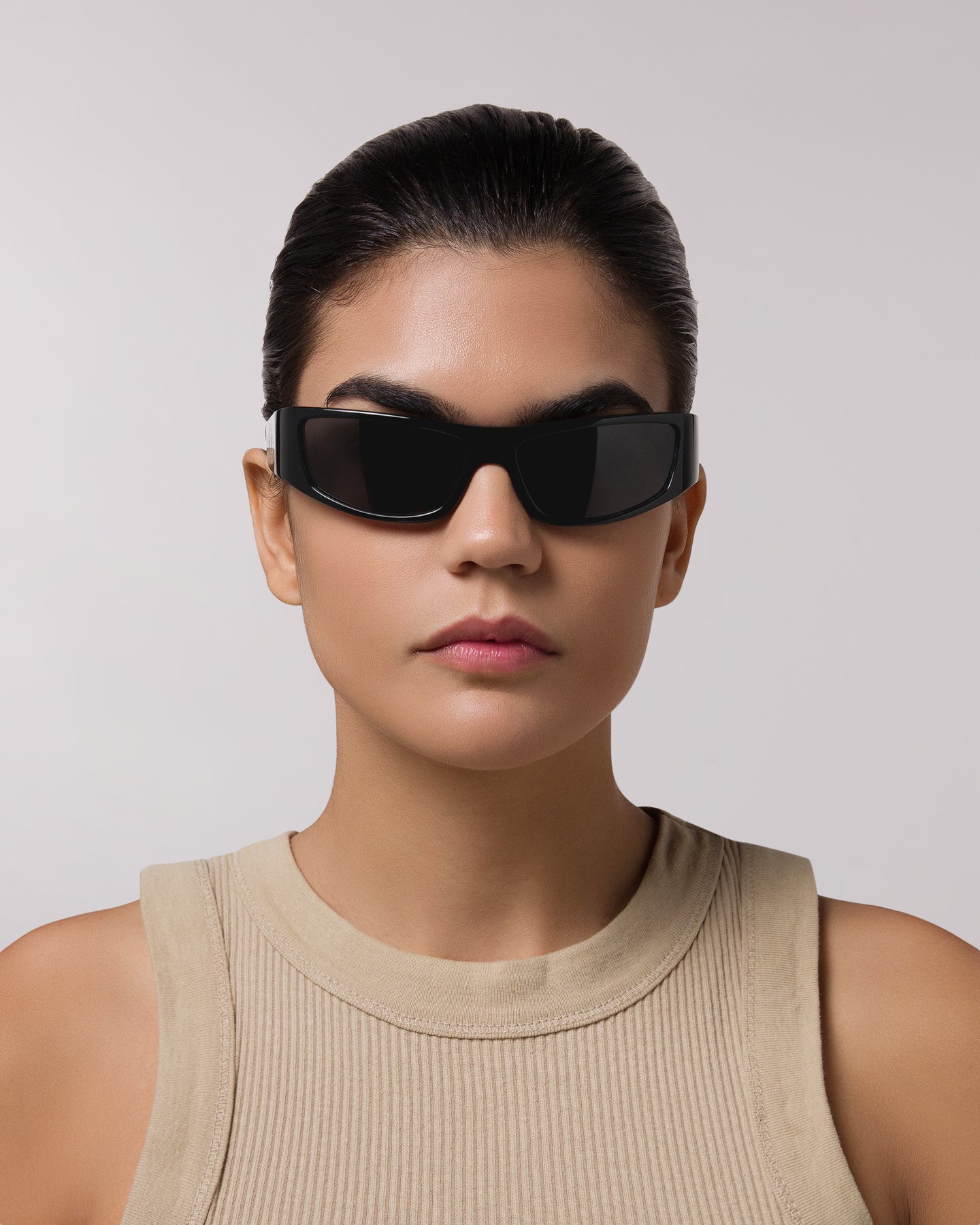 Front view of model wearing sunglasses  | Rectangular sunglasses with black lenses and black frames | Acetate | Sir | Women's sunglasses | Karen Wazen Eyewear