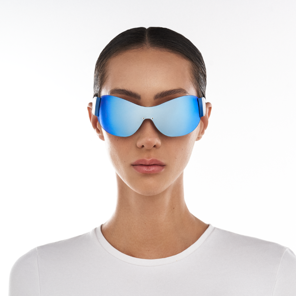 Front view of model wearing sunglasses | Mask sunglasses with Mirror Blue lenses and Blue frames | Metal & Acetate | Ski | Women's sunglasses | Karen Wazen Eyewear